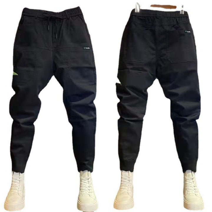 Men's sporty cargo jogger pants with elastic waistband, drawstring, and tapered leg hem StylebySassy