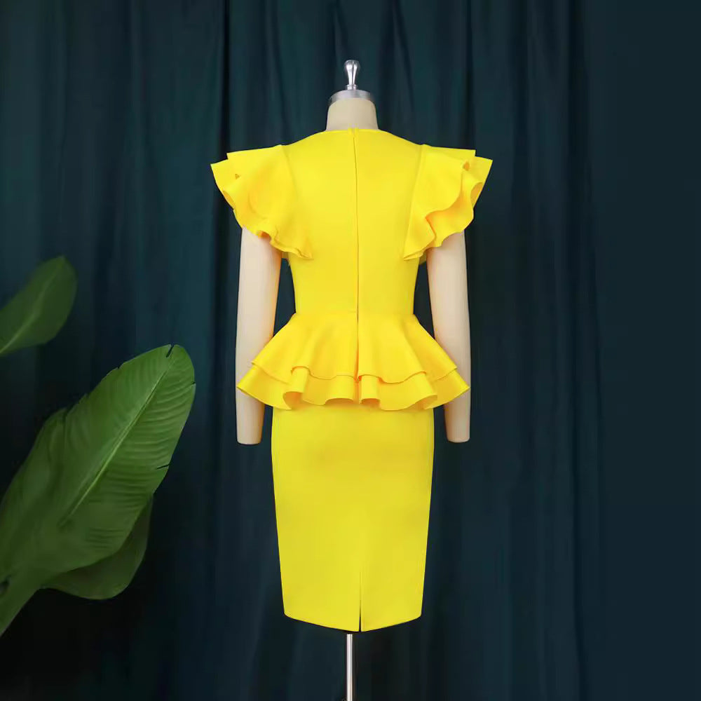 Ladies fitted dress with voluminous ruffle hem StylebySassy