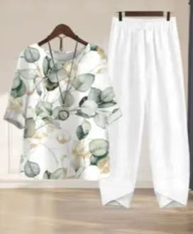 Women's lightweight tunic two-piece made of viscose-linen blend with V-neck, three-quarter sleeves, and ankle-length comfort waistband pants StylebySassy