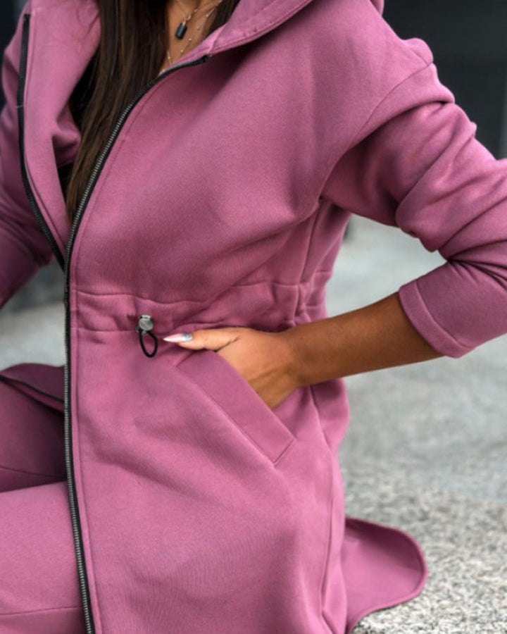 Women's long sweat hoodie jacket with two-way zipper, drawstring waist, side pockets, and side slits StylebySassy