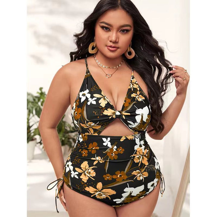 Women's one-piece swimsuit with trendy cut-out and colorful geometric design StylebySassy
