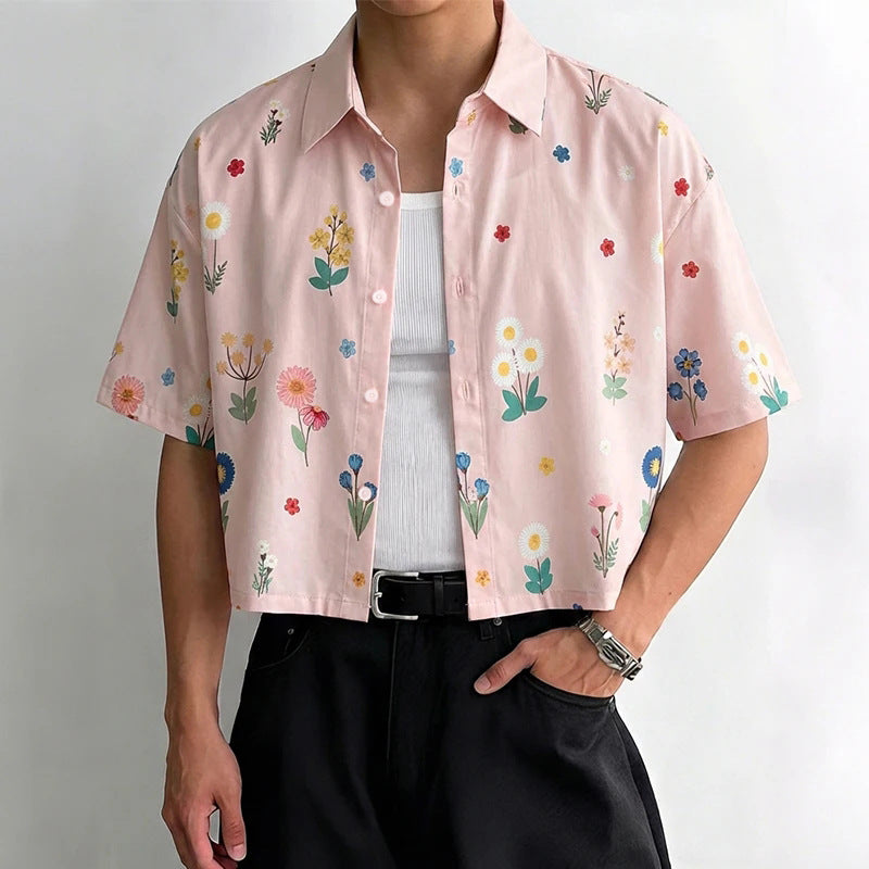 Women's loosely cut short sleeve shirt blouse with floral all-over print, shirt collar and short hem StylebySassy