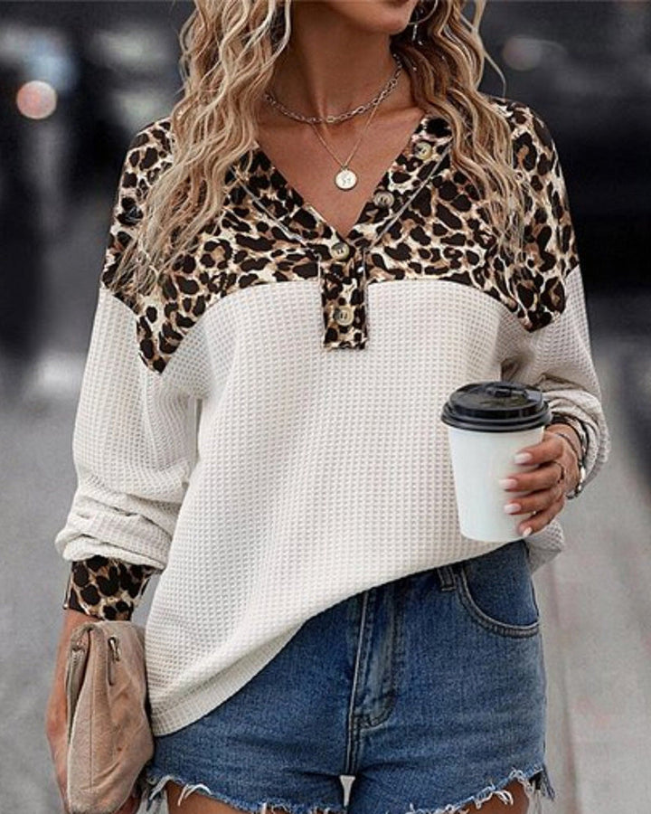 Women's loose waffle knit long sleeve shirt with leopard print yoke and Henley button placket StylebySassy
