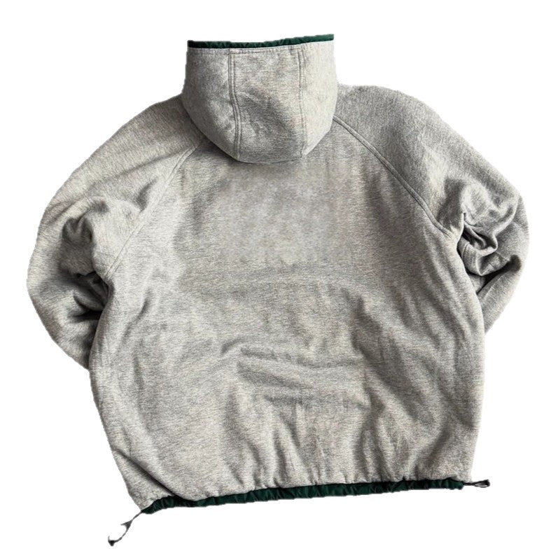 Unisex non-fitted windbreaker with hood padded fleece lining drawstring hem and decorative stripes on sleeves StylebySassy