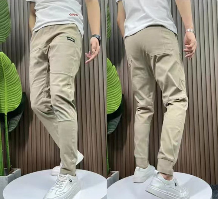 Men's sporty cargo jogger pants with elastic waistband, drawstring, and tapered leg hem StylebySassy