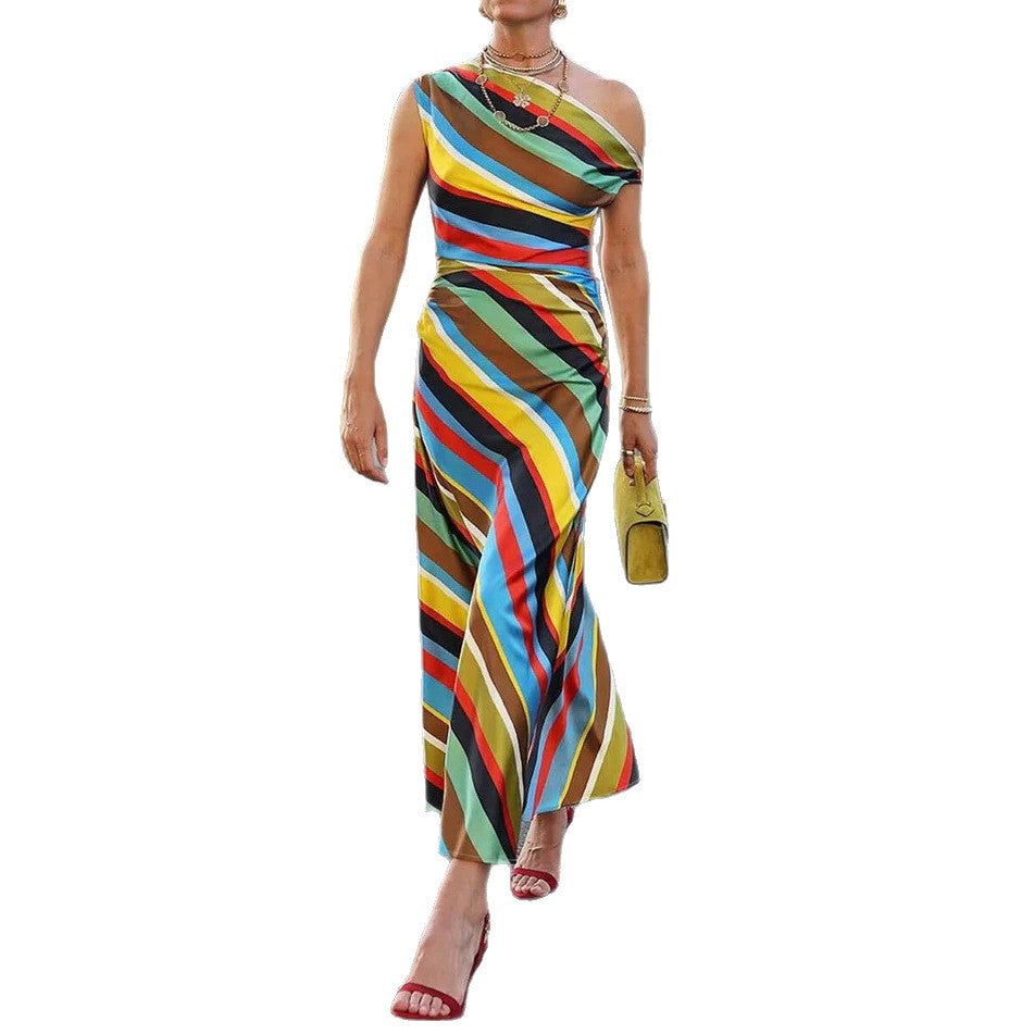 Women's asymmetrical off-shoulder maxi dress with diagonal stripe pattern and fitted silhouette StylebySassy