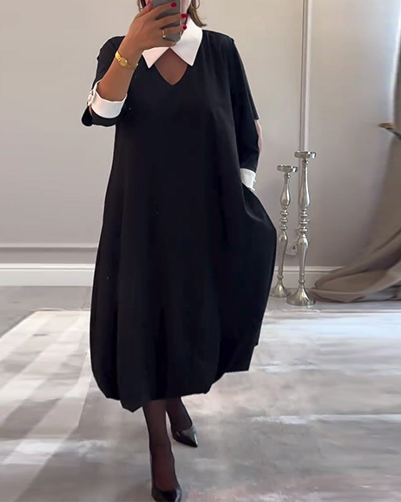 Women's casual midi dress with pointed contrast collar, cuffed sleeves, side pockets, and balloon hem StylebySassy