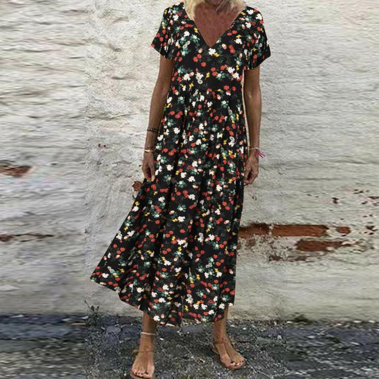 Women’s V-neck maxi dress with fine pleated skirt, empire bodice and short sleeves StylebySassy