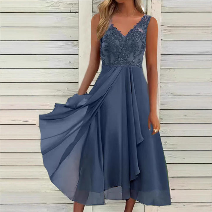 Women's elegant evening midi dress with embroidered lace bodice, tailored draping, and flowing layered skirt StylebySassy