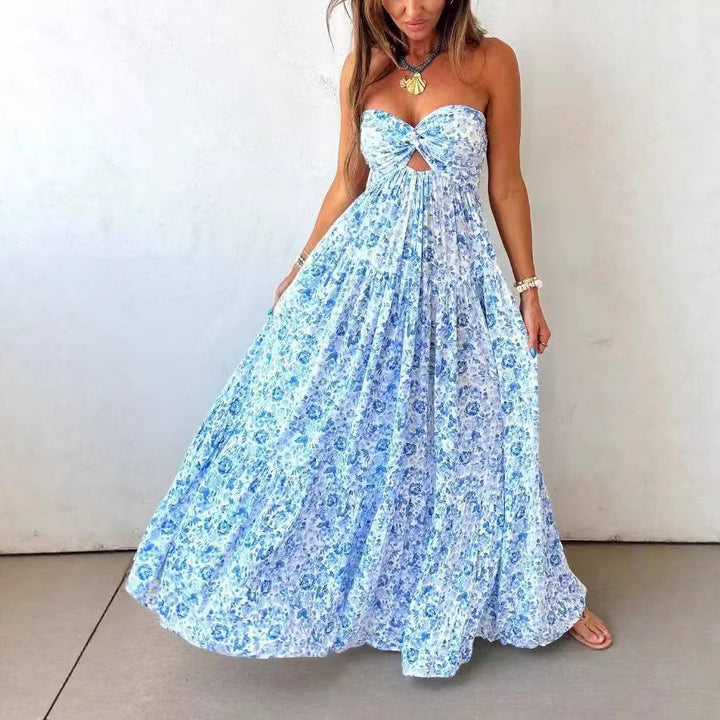 Ladies' strapless twisted bustier maxi dress with cut-out and multi-layered tiered skirt in lightweight crinkle quality StylebySassy