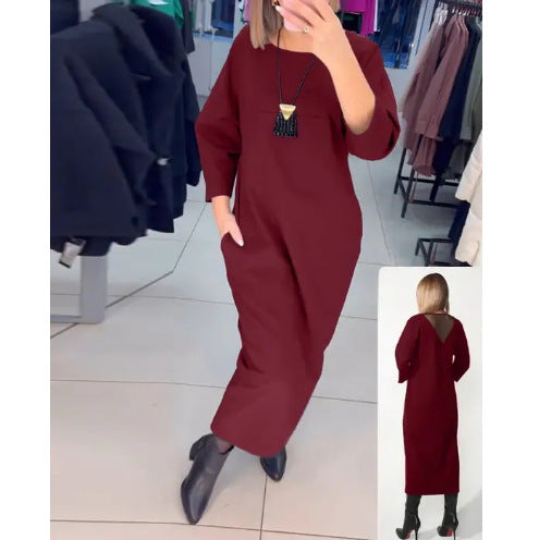 Women's straight maxi dress with ankle-length silhouette, half-length sleeves, side pockets, and transparent V-back StylebySassy