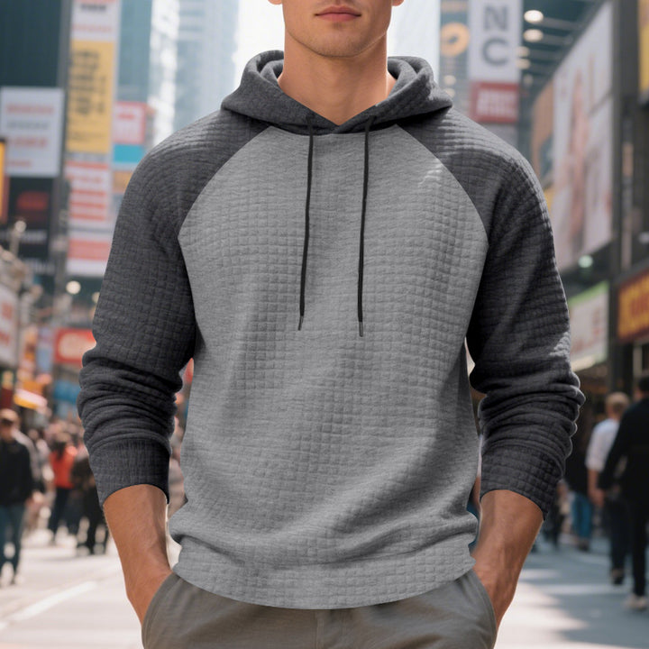 Men's quilted hoodie with raglan sleeves and drawstring StylebySassy