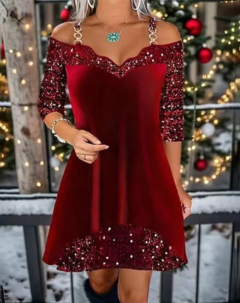 Women's off-shoulder sequin swing dress with delicate chain straps, elbow-length sleeves, and ruffle trim StylebySassy