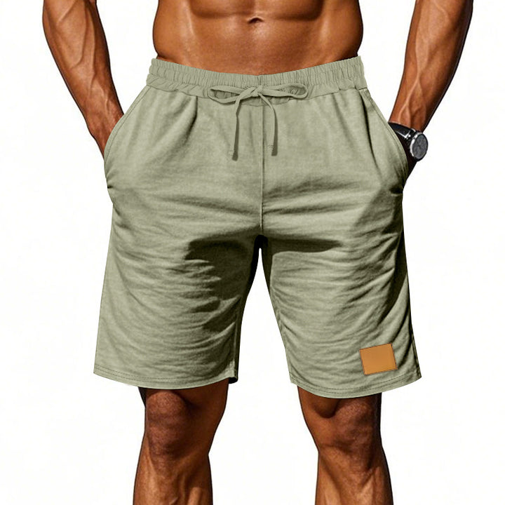 Men's drawstring Bermuda shorts made of soft cotton blend with elastic waistband and side pockets StylebySassy