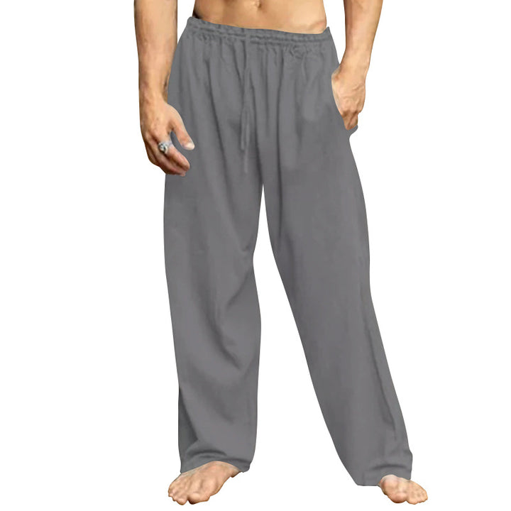 Men's relaxed trousers with wide leg elastic drawstring waistband and side pockets StylebySassy