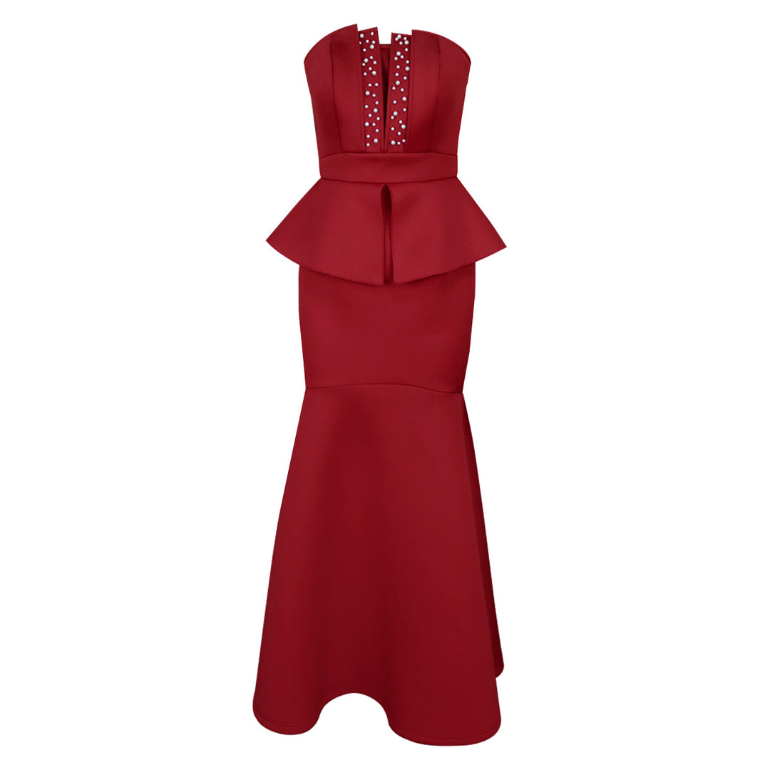 Women's evening dress with shimmering details and voluminous peplum drape