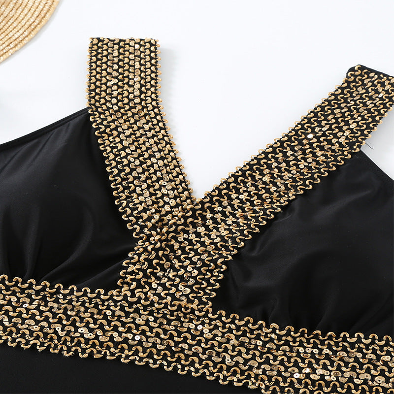 Women's one-piece swimsuit with decorative golden details StylebySassy
