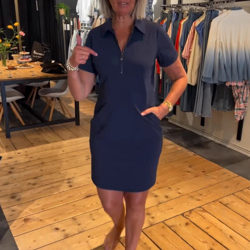 Women's nan leggeres polo dress with zipper collar, short sleeves and practical side pockets StylebySassy