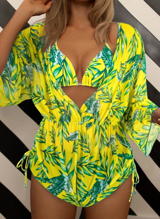 Women's swimsuit with elegant V-neckline and playful palm print StylebySassy
