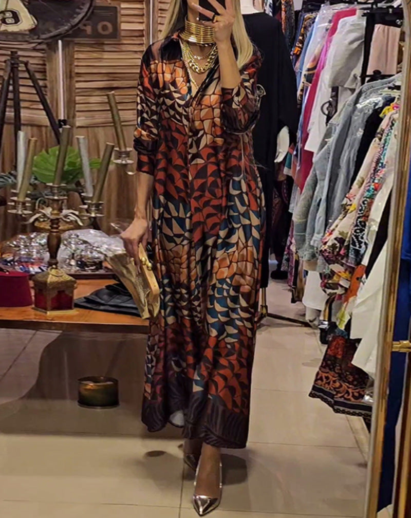 Women's flowing satin shirt dress with shirt collar, geometric mosaic print, and casual maxi length StylebySassy