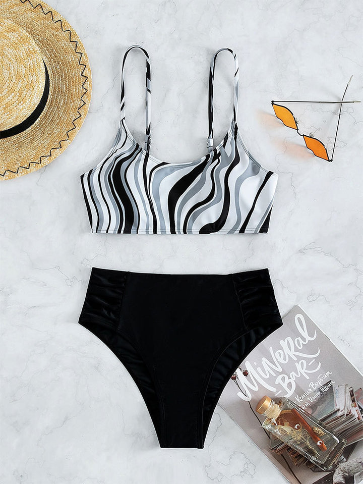 Women's swimsuit set with stylish striped top and high-waisted bottom StylebySassy
