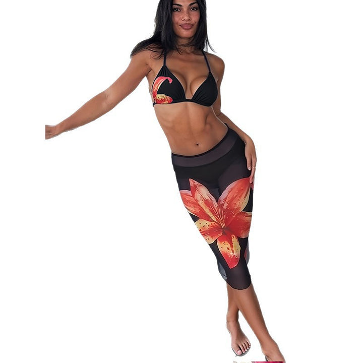 Women's bikini set with floral accents and form-fitting skirt StylebySassy