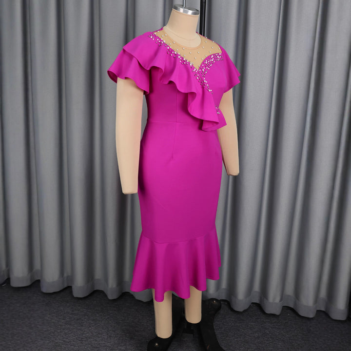 Women's figure-hugging dress with ruffle design and rhinestone accents StylebySassy