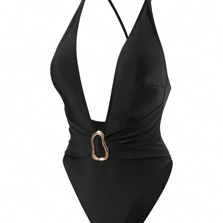 Women's one-piece swimsuit with deep V-neckline and elegant decorative element StylebySassy