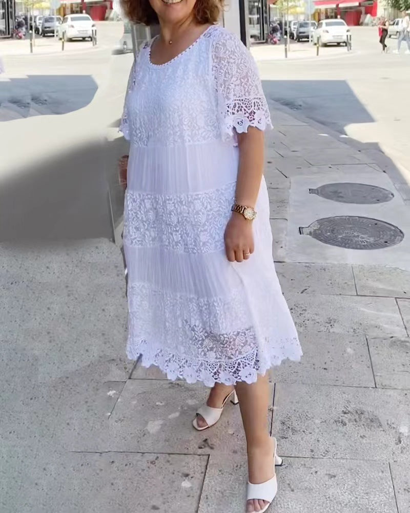 Women's midi dress with lace tiers, pleated inserts and short trumpet sleeves StylebySassy