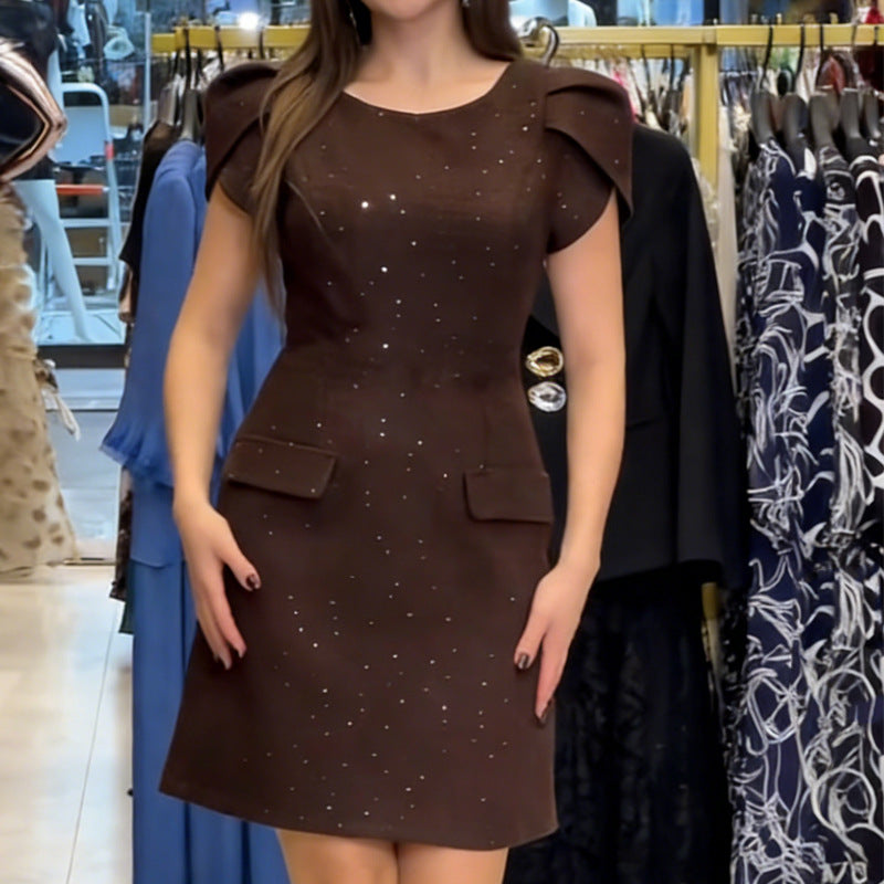 Ladies elegant evening dress with shimmering accents and voluminous sleeves StylebySassy