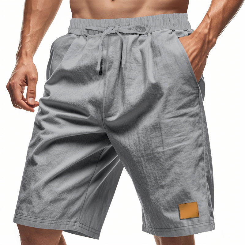 Men's drawstring Bermuda shorts made of soft cotton blend with elastic waistband and side pockets StylebySassy