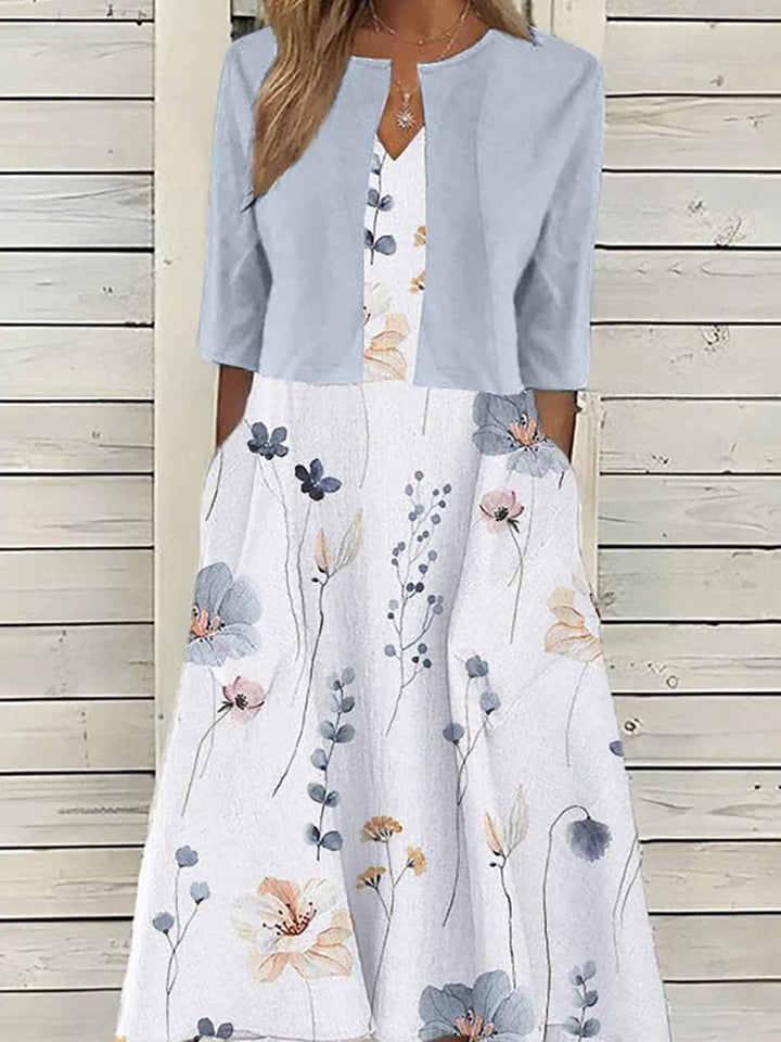 Women's maxi dress with separate bolero, V-neck, inset pockets, and floral A-line silhouette StylebySassy