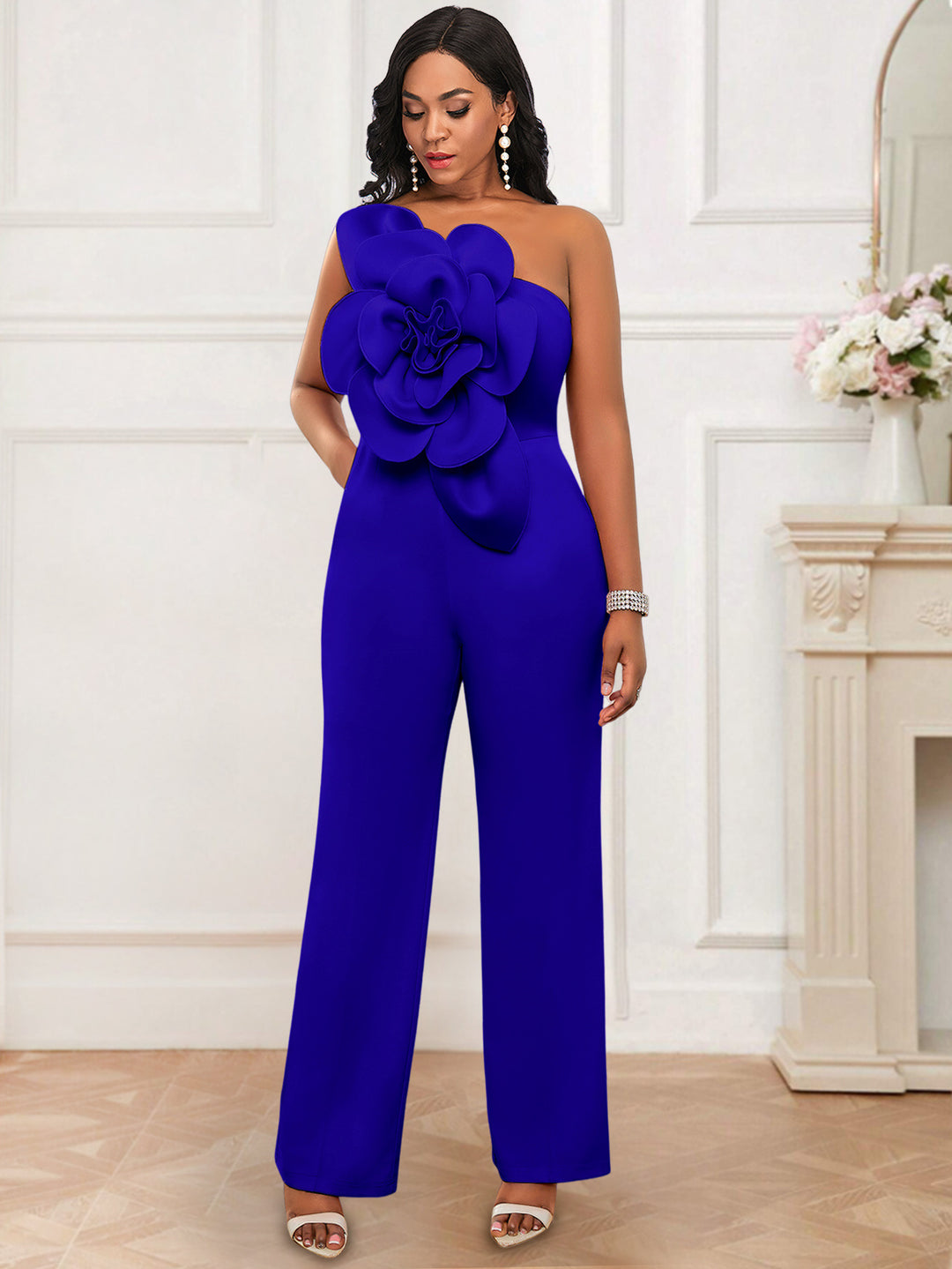 Ladies elegant overall with large floral accent on top
