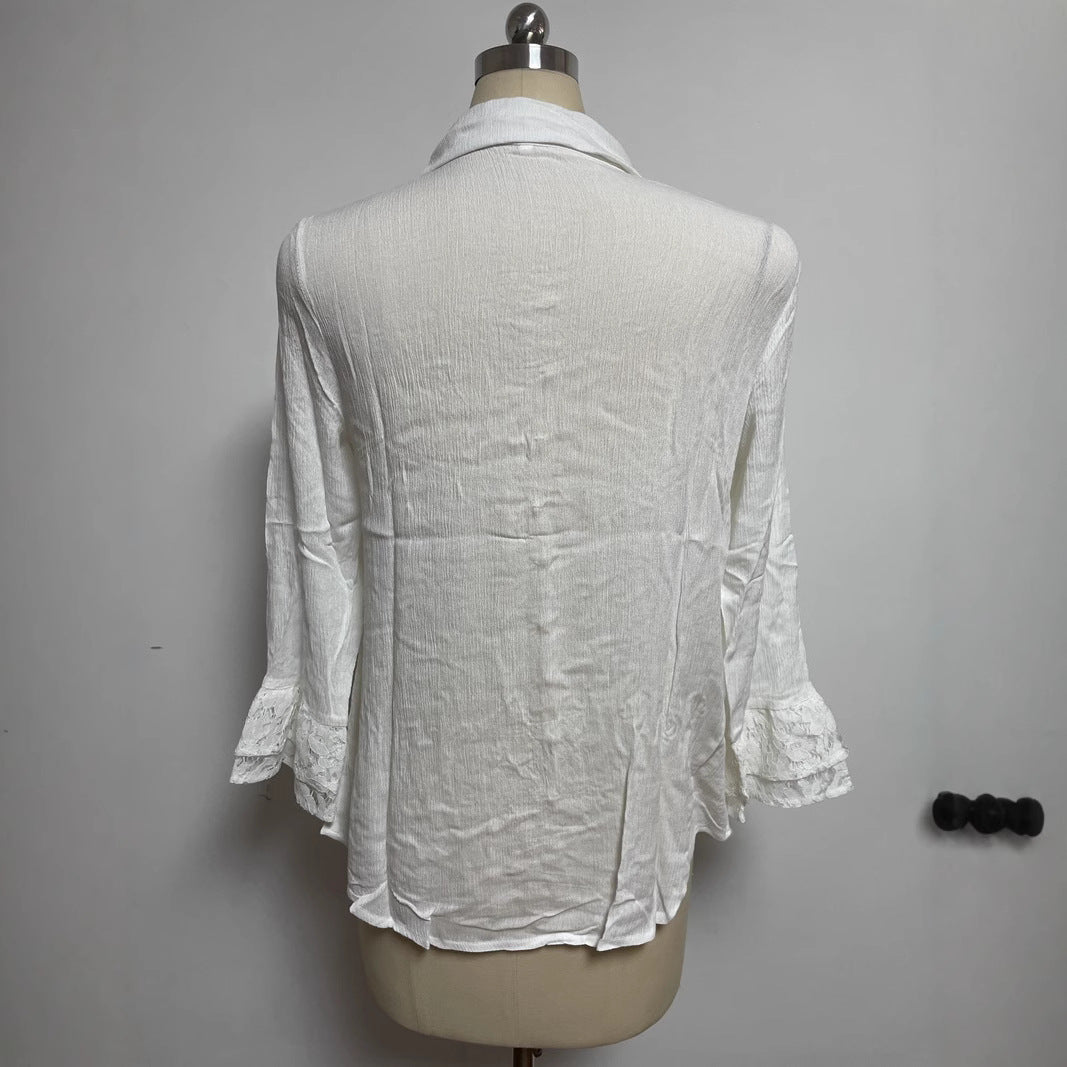 Ladies' semi-transparent crepe blouse with lace yoke, fabric-covered buttons, and three-quarter flounce sleeves StylebySassy