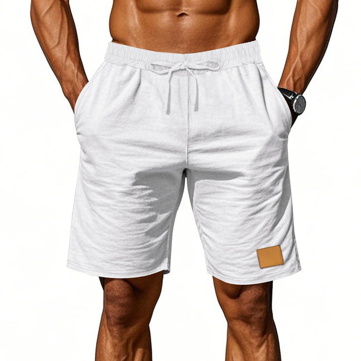 Men's drawstring Bermuda shorts made of soft cotton blend with elastic waistband and side pockets StylebySassy