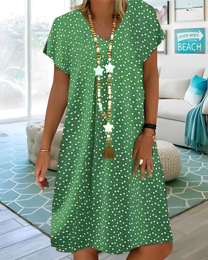 Ladies nan locker falling V-neck short dress with A-line cut, cap sleeves and all-over heart print StylebySassy