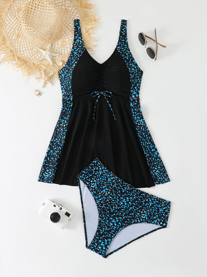 Ladies swimsuit with fashionable ruffle dress look StylebySassy