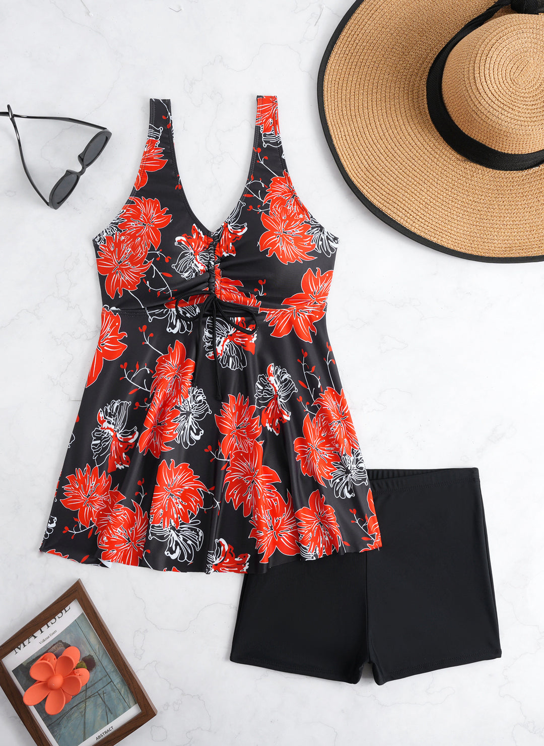 Ladies' tankini set with stylish ruffle and graphic peacock pattern StylebySassy