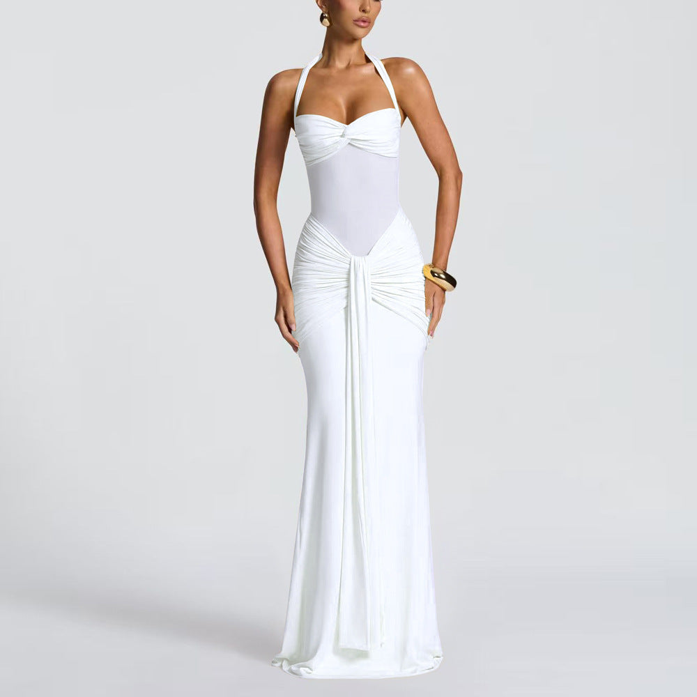 Women's figure-hugging halter evening dress with transparent mesh insert and gathered hip area StylebySassy