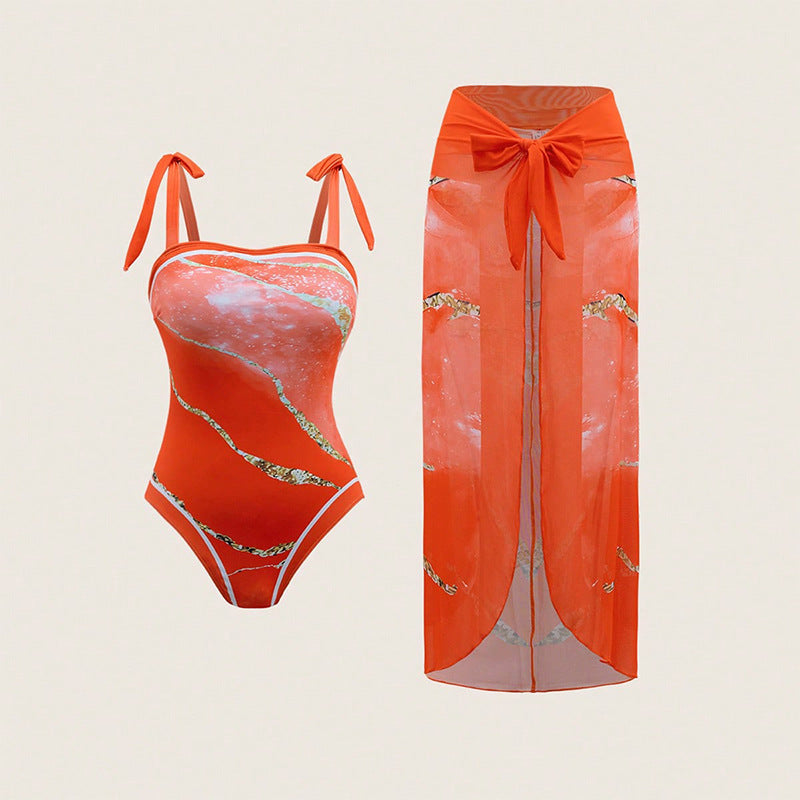 Women's one-piece swimsuit with sheer wrap skirt StylebySassy