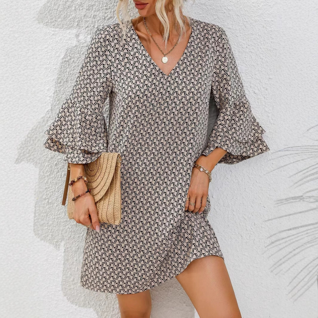 Women's flowing tunic mini dress with V-neck graphic chain pattern and double-layered bell sleeves StylebySassy
