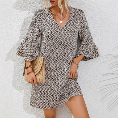 Women's flowing tunic mini dress with V-neck graphic chain pattern and double-layered bell sleeves StylebySassy