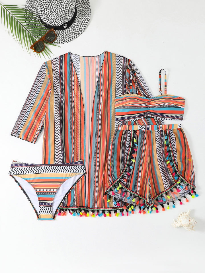 Women's bikini set with colorful wrap skirt and playful pom poms StylebySassy