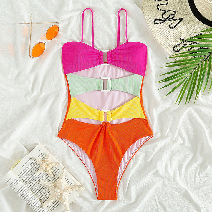 Women's one-piece swimsuit with colorful layered design and buckle StylebySassy