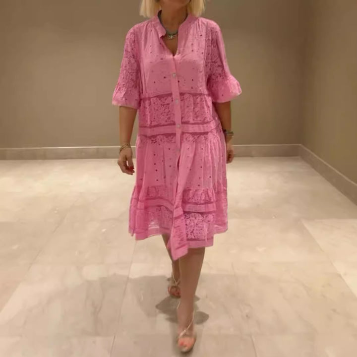 Women's romantic midi dress with broderie anglaise, buttoned top, stand-up collar, half-length flounce sleeves, and tiered hem StylebySassy