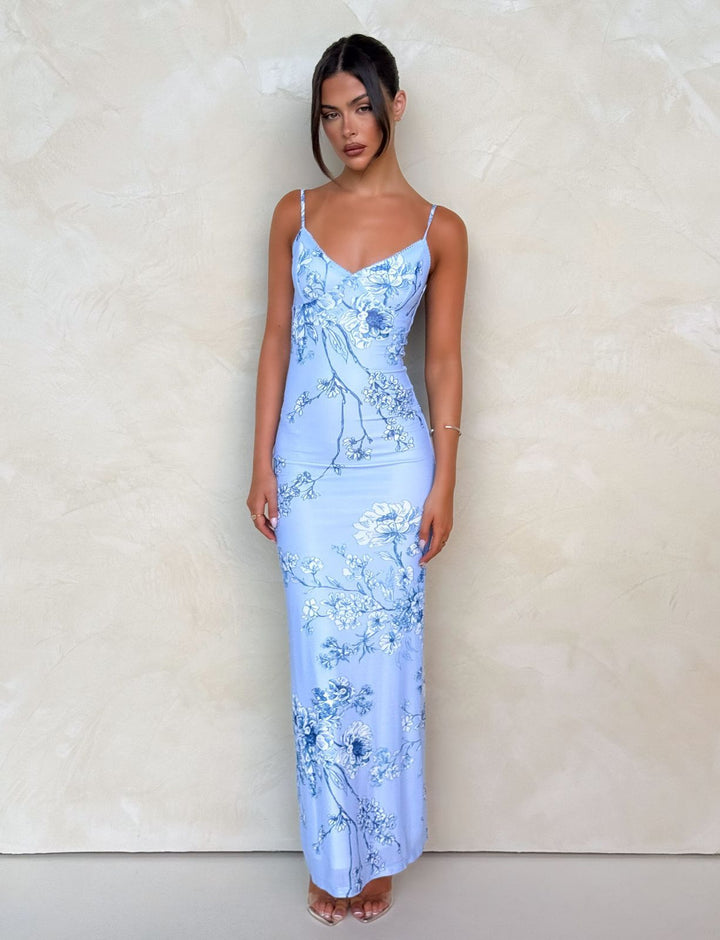 Women's body-hugging slip maxi dress with spaghetti straps, bodice seam, and floral-baroque digital print StylebySassy