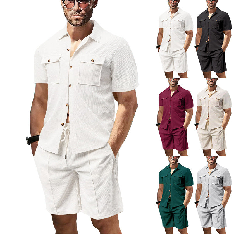 Men's modern short-sleeve shirt set in resort style with patch pockets, open lapel collar, and drawstring Bermuda shorts made of textured jersey StylebySassy