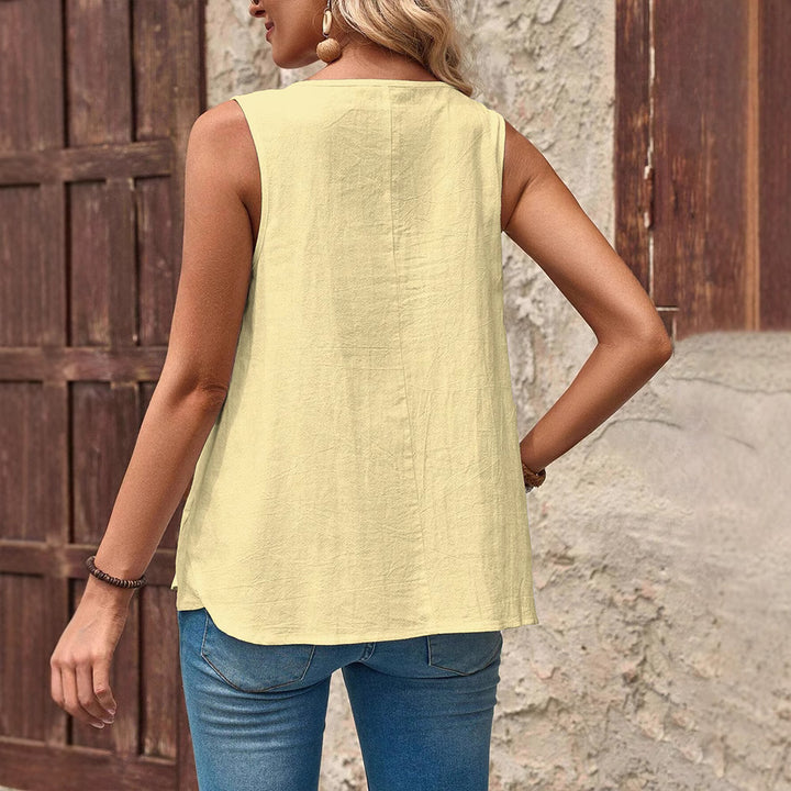 Women's sleeveless summer top with palm motif, decorative button placket and loose fit StylebySassy