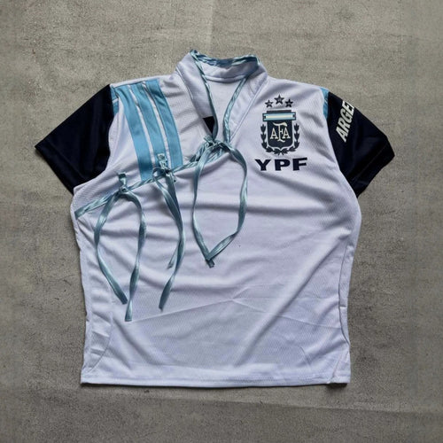 Women's sports jersey with a figure-hugging cut and innovative ties StylebySassy