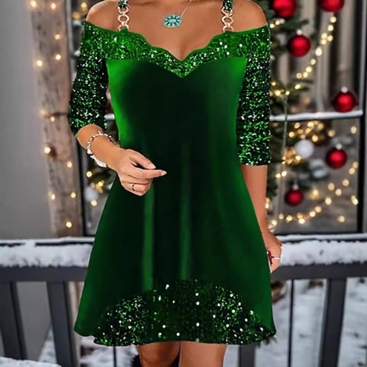 Women's off-shoulder sequin swing dress with delicate chain straps, elbow-length sleeves, and ruffle trim StylebySassy